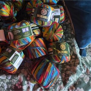 Lion Brand Incredible Yarn 16 full balls plus partial ball & knitted shawl piece